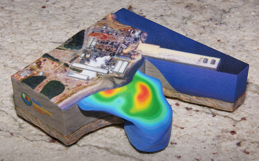 Full-color 3D printed coastal facility model with separable geology layers, TCE contamination, buildings, and aerial photo